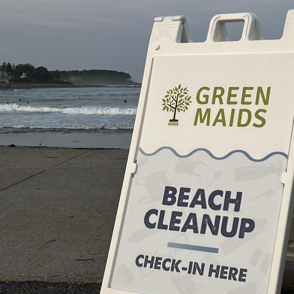 Photo of Green Maids beach cleanup sign at the beach